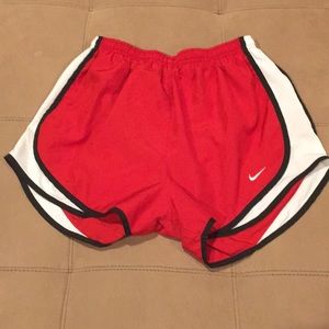red nike shorts